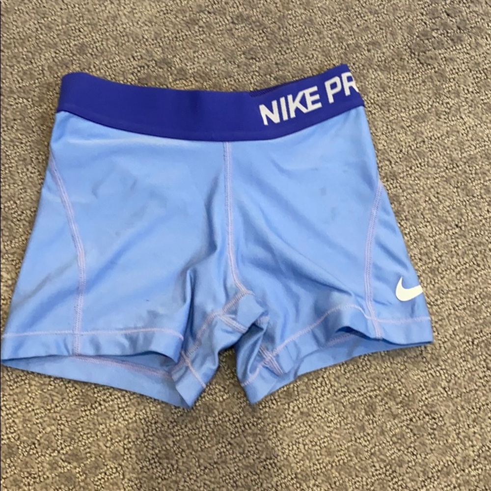 Blue Nike pros
